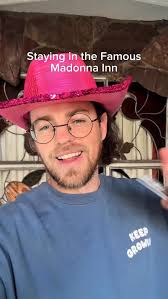 Stepped into a floral wonderland 🌼💖 The Krazy Dazy room at the Madonna  Inn is WILD—think daisy walls, pink shag carpet, and the quirkiest retro  bathroom you've ever seen. 🌸✨ This hotel