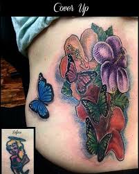 Cover up tattoos are associated with people that are living with a tattoo regret. 28 Awesome Butterfly Tattoos With Flowers That Nobody Will Tell You Butterfly Tattoo Cover Up Tattoos Butterfly Tattoo Cover Up