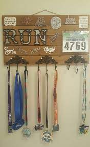 Diy Medal Display Purchased Sayings Board And Small Hooks At Michael S Craft Store And The Medal Holde Medal Display Diy Running Medal Display Running Medals