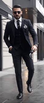 Black 3 Piece Suit Combinations Classic Black Three Pice Suit With A Black Knit Tie White Button Up Shirt Silk Black And White P Black Three Piece Suit Black Suit Men Three Piece Suit Wedding