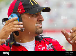 James Pohlman, crew chief for Juan Montoya works in the garage area during  practice for the NASCAR Brickyard 400 auto race at the Indianapolis Motor  Speedway in Indianapolis, Friday, July 29, 2011. (