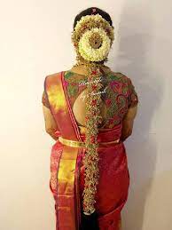 South Indian Bridal Hairstyle By Swank Braids With Fresh Flowers And Hair Accessories Bridal Silk Indian Bridal Hairstyles Indian Bridal Indian Bridal Makeup