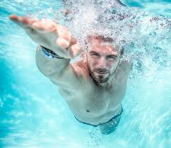 Health Young Man Swimming The Front Crawl In A Pool Taken Underwater Man Swimming Swimming Pool