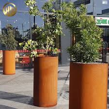 When exposed to the elements the steel forms a protective layer on its surface and produces the rust patina color. Outdoor Round Corten Steel Rusty Metal Decoration Plants Nursery Planter Buy Rusty Metal Planter Corten Steel Planter Outdoor Decoration Planter Product On Shandong Hy Metal Products Ltd