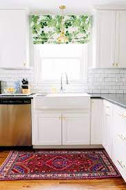 Picture windows do not open and look gorgeous over sinks. Kitchen Sink Window Decorating Ideas Apartment Therapy