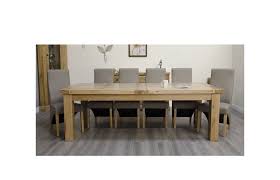 Be mindful that the width of your dining chairs and the width of the table will make an impact on the number of guests you may sit comfortably. Deluxe Oak Extra Large Extending Table Seating 10 To 14 People Furniture4yourhome