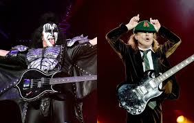 Jonathan clarke of new york's q104.3 radio station recently spoke with kiss frontmangene simmons on his out of the box show to clarify the bassist's statements declaring that rock is dead.. Kiss Gene Simmons On First Meeting Ac Dc S Angus Young He Didn T Have Front Teeth