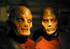 Alex Zahara ("Warrick") and Patrick Currie ("Eamon") in SG-1 7x08 Space  Race. You can still recognize them from their eyes, but I will share 1-1  screenshot from 1969 and Unnatural Selection.