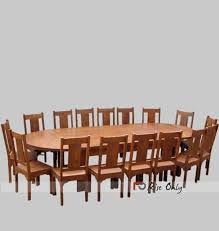 Large dining area featuring a classy dining table and chairs set on top of an area rug. Oval Shaped Luxury Extension Dining Table Set With Chairs Exclusive Wooden Office Conference Table And Chairs Large Dining Room Table Set With Chairs Corporate Conference Table In Sheesham Wood