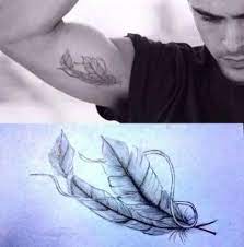 Amongst the most sought after designs for men tattoos is the feather tattoo. Tattoo Feather Arm Men Black 21 Ideas Feather Tattoos Feather Tattoo For Men Feather Tattoo Bicep
