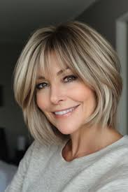 34 Elegant Hairstyles for Women Over 50 with Bangs in 2024