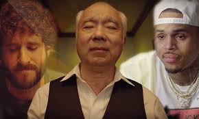 Lil Dicky & Chris Brown trade bodies in "Freaky Friday"