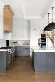 Welcome to our gallery featuring 52 dark kitchens with dark wood or black cabinets. White Upper Cabinets And Dark Gray Lower Cabinets Cottage Kitchen