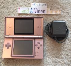The color screens are now even brighter and the lower touch screen provides a totally new way of playing and controlling games. Nintendo Ds Lite Handheld Console Metallic Pink Nintendogs Paw Print 1789617117