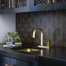 A lovely wet bar will enhance both the comfort and splendor of your home. Gold And Black Wet Bar Design Design Ideas