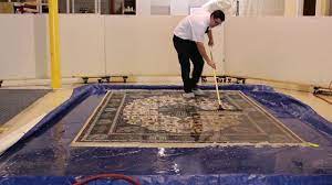 To remove stains, dip a microfiber cloth into a mixture of warm water and a tablespoon of laundry detergent. How To Properly Clean Fine Wool Area Rugs Youtube