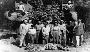 The Prince of Wales and his prize tiger that he shot on his hunting expedition into the Himalayas, Nepal, January 29, 1922. From left. Lord Cromer, Sir Lionel Halsey, The Prince of