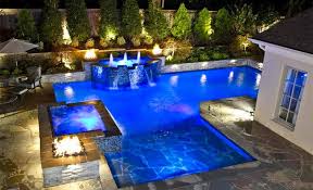 And when they do, you get stunning aquatic design features that elevate the beauty and sophistication of your outdoor space. 15 Dramatic Modern Pool Areas With Fire Pits Home Design Lover