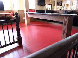 Red oak hardwood floors have been america's favorite choice for hardwood flooring for decades. Use Acrylic Floor Paint This Dining Room In A Restaurant Was Painted Farmhouse Red Bar Design Restaurant Painted Floors Flooring