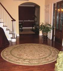 Simple preparation can help you achieve a smoothly bound edge for any sized round rug, from a small throw rug to a large area rug. How You Can Use Round Rugs In Decoration Entrance Rugs Entryway Rug Round Entryway Rug