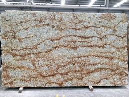 This polished and glazed granite floor with ash and black tiles is an absolute beauty when used for your hall. China Brazil Solarius Verniz Tropical Gold Slabs Granite For Kitchen Bathroom Countertop Vanity Top Wall Floor Design China Cut To Size Tiles Luxury Stone