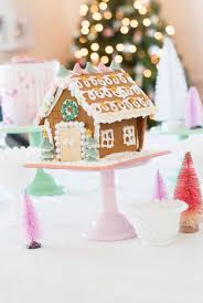 Now the gingerbread houses themselves in this example are pretty standard, but i really love the idea of the snow globe that is placed over them. Pastel Gingerbread House Decorating Party Project Nursery