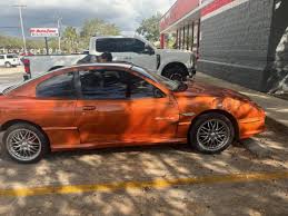 Image result for Sunburst Orange 2004 Pontiac