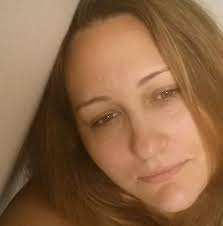 unparked car rolls over elderly woman