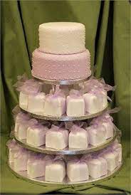Light Purple Wedding Cake With Individually Wrapped Petit Fours Vegan Wedding Cake Wedding Cake Alternatives Vegan Wedding