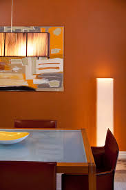 There is a middle wall divider, so it separates the two. Color Feast When To Use Orange In The Dining Room