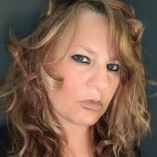 A Light in the Darkness: Rowan, Peggy: 9781666746853: Amazon.com: Books