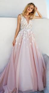 A Pink Wedding Dress Without Sleeve With A A Covered Plunging Neckline And White Lace Appliques On The Bodice A Line Wedding Dress Wedding Dresses 2017 Gowns