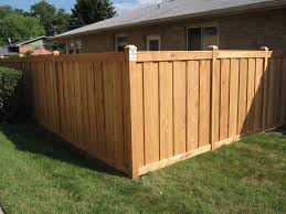 Board and batten fencing is a full privacy fence style similar to a vertical board fence in construction, but built with a deliberate space between the back boards which is overlayed with a batten board creating a private fence panel. Cedar Fencing From Cardinal Fence And Supply In Bensenville