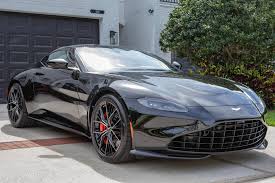 Image result for Marron Black 2021 Aston Martin