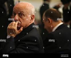 Nicolo Pollari, head of SISMI military intelligence, right and Mario Mori,  head of the domestic intelligence agency SISDE, look