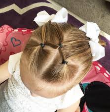 Elastic Styles Are Basically A No Fail When It Comes To Toddlers It S An Easy Way To Keep Their Girl Hairstyles Little Girl Hairstyles Easy Toddler Hairstyles