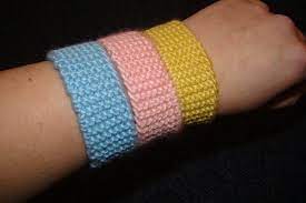 Craftster user vysews used see mi knit's knitted bangle tutorial to make the cozy yet elegant pair of bangle bracelets pictured above. Knitted Bracelets A Knit Or Crochet Bracelet Knitting On Cut Out Keep