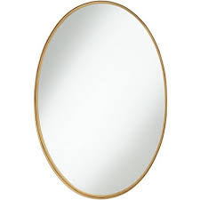 The bold industrial character of an early working table inspired this striking mirror. Oval Mirrors Target