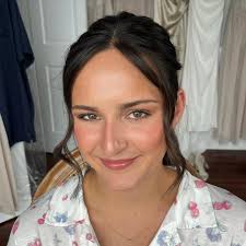 Makeup by Sarah Worrell added a...