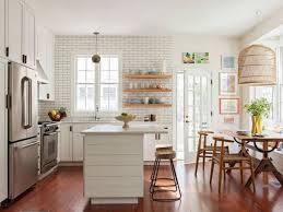 We took into consideration which rooms had the best views, and from there we decided how to incorporate the view within the design. California Casual Design Style Open Concept Kitchen Living Room Interior Design Kitchen Kitchen Interior