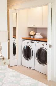 If space is particularly tight, consider a recessed dryer vent. Cabinets Over Washer And Dryer Design Ideas
