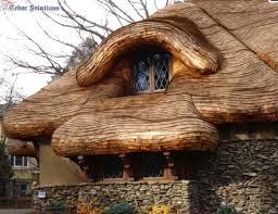 Cedar shingles lend dimensionality to a home's design. Steam Bent Shingles Insteading