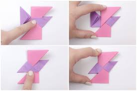 Now, fold the right tip over and unfold. Origami Ninja Star Tutorial