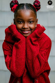 Girl who who was denied school photos for red hair extensions rocks photo  shoot