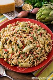 Tap strainer against sink to drain well, then return couscous to the pot, cover pot with a kitchen towel and return lid. Israeli Couscous Salad With Artichokes And Roasted Red Peppers A Family Feast