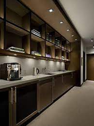 And overhead lighting illuminate walkways and dining spots. Led Puck Lights Kitchen Lighting Layout Kitchen Sink Lighting Led Under Cabinet Lighting