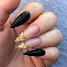 Black And Gold Acrylic Nails Short Stiletto Nails Black And Gold Nails Acrylic Nails Fall Nails Acrylic Nails Acrylicnailsshort Gold Stiletto Nails Gold Nails Gold Acrylic Nails
