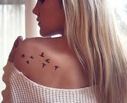The symbol represents a huge eagle with its fantastic claws ready to perch on something with the numerous small eaglets behind it. 30 Beautiful Bird Tattoos For All The Pretty Girls Who Want To Fly Trend To Wear Bird Shoulder Tattoos Shoulder Tattoos For Women Tattoos