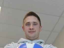 Kuhr takes the reigns as Huskies volleyball coach