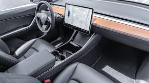 Using the chassis, interior, and powertrain from the smaller model 3, the 2021 tesla model y adds additional cargo space, an optional third row of seats, and suv styling to the more affordable end of the brand's offerings. Tesla Model Y Interior Review Much More Than A Model 3 Xl